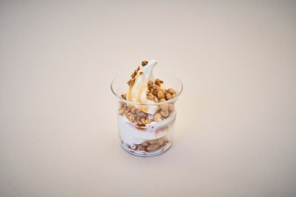A rice soft serve sundae topped with steamed beans
