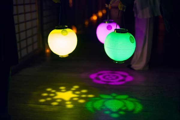 NAKED Distance Lanterns casting light patterns on the floor