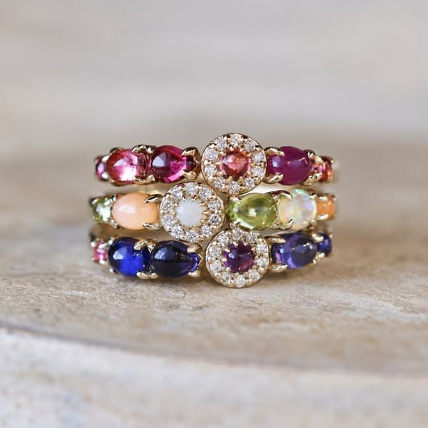 Rounded gemstones create layered light and color