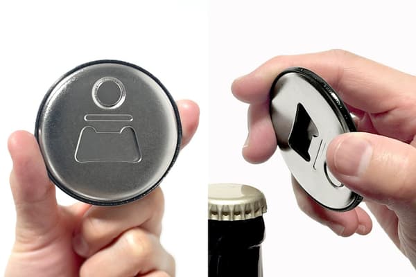 Back of the bottle opener magnet, shown in use on a bottle cap