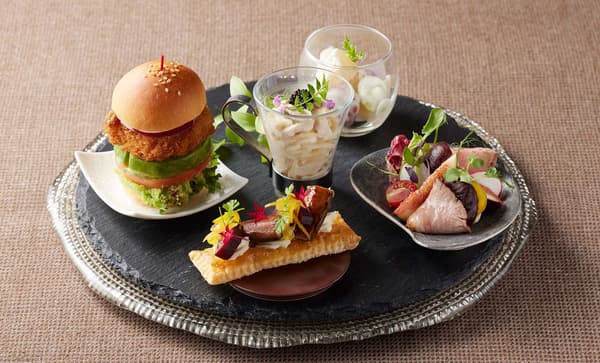 Five savories including shrimp cutlet burger sandwich, shira-ae, chilled pasta, eggplant with eel petit four, and roast duck salad