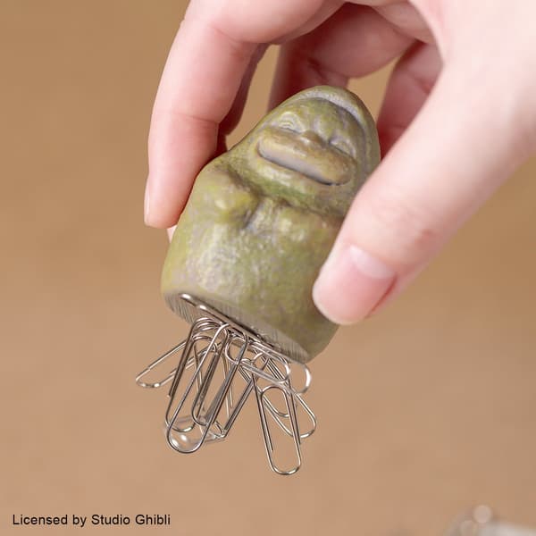 A magnet is built into the base of the stone figure