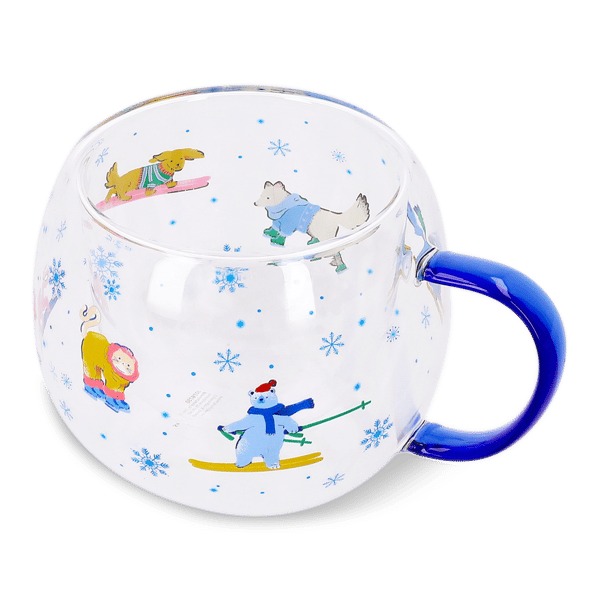 Glass mug with skiing animals