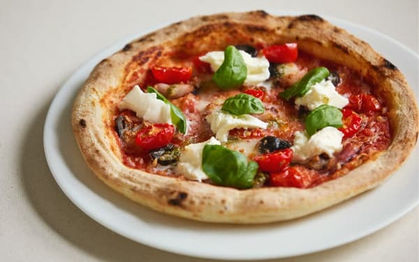Pizza baked in a proper pizza oven