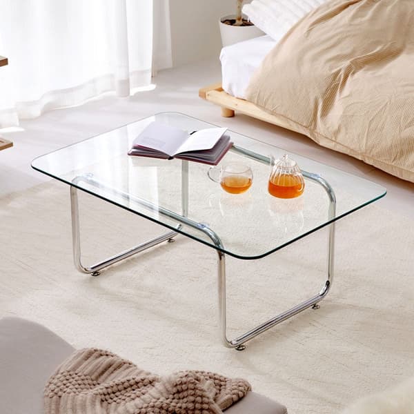 Mesa baja de cristal cuadrada luce