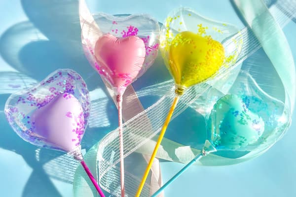 Confetti-filled stick balloons