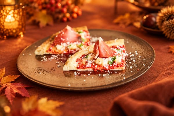 Pizza Margherita with prosciutto