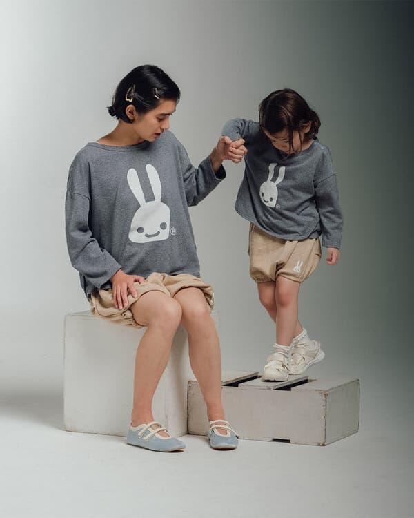 下摆滚边长袖针织衫与南瓜裤