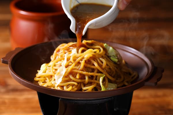 Yakisoba finished with Kyukamura's secret sauce