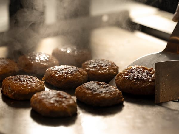 Hamburg Steak and Butter Corn cooked on an Iron Plate