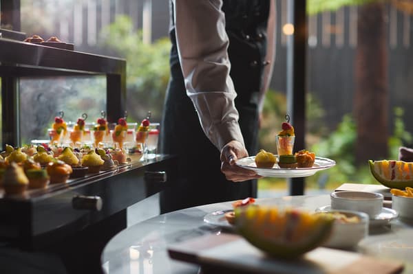 Wagon service with sweets and savories delivered to the table at The Royal Lounge: Sweet Symphony