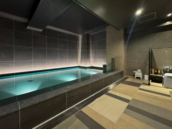 A large communal bath to unwind in after a day of travel
