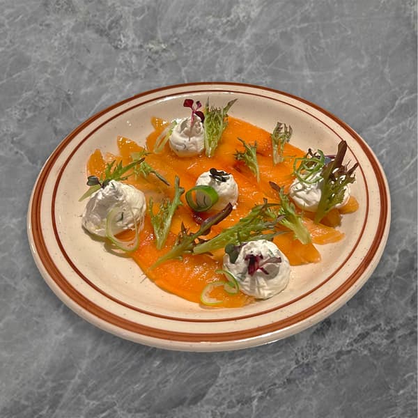House-Cured Salmon Gravlax - salmon with salt and dill, served with lemon cream