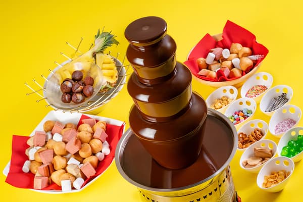 Colorful soft-serve parfaits and a chocolate fountain at the dessert corner