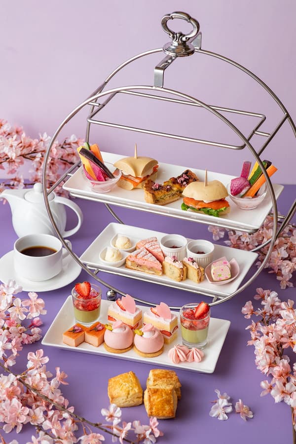 Afternoon tea stand with cherry blossom themed sweets
