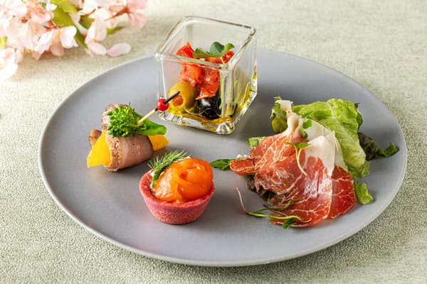 Menu crafted to complement champagne and cocktails by chef Takagi