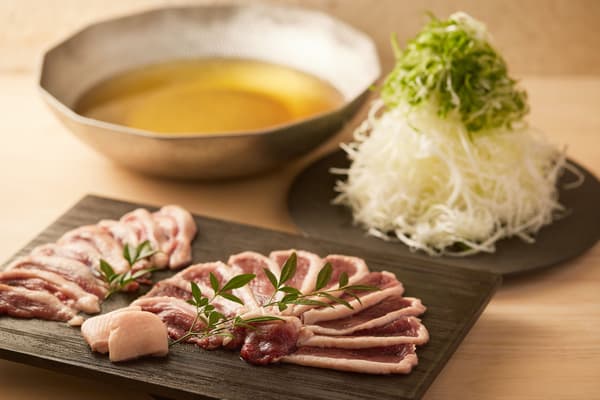 Shabu-shabu bebek dengan daun bawang Kujo