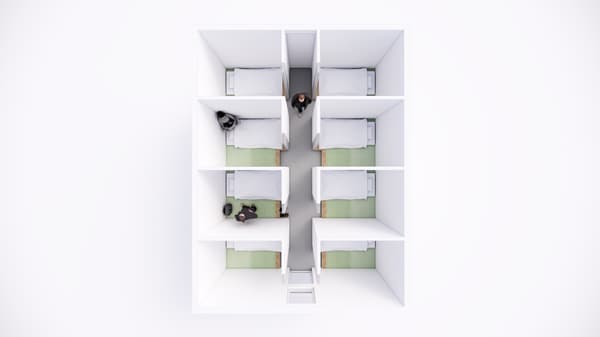 The dormitory area, with 8 semi-private cabins arranged per room.