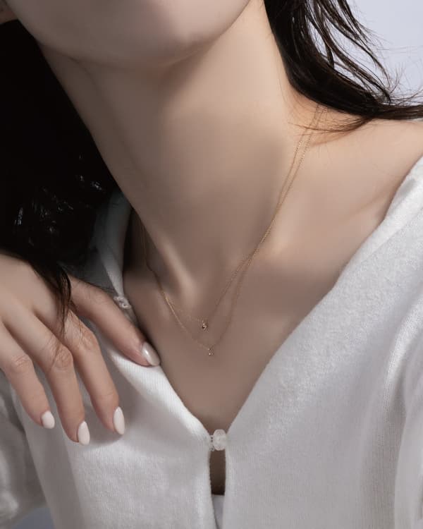Styling image of the Teeny-Tiny necklaces