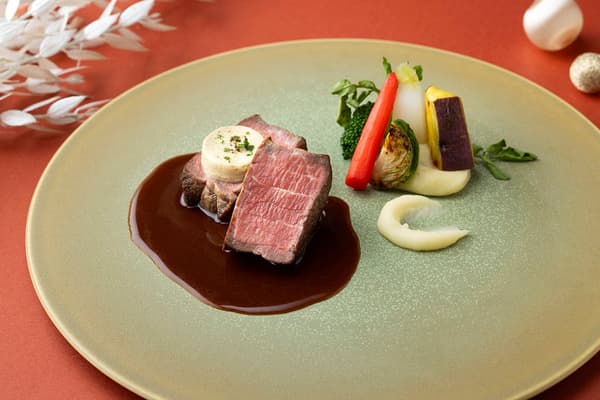 Beef Fillet Steak and Foie Gras Butter in a Red Wine Sauce, With Potato Purée and Colorful Vegetables