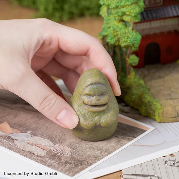 The stone figure can be used as a paperweight