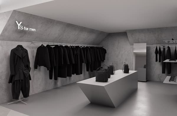 Zona de Y's for men con pared inclinada y mesa de exposición