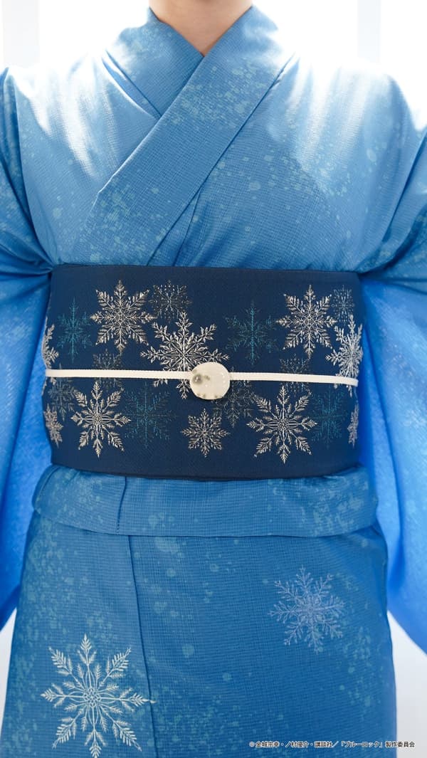 El obi está bordado con un diseño de copo de nieve. El obi-dome tiene forma de oveja.