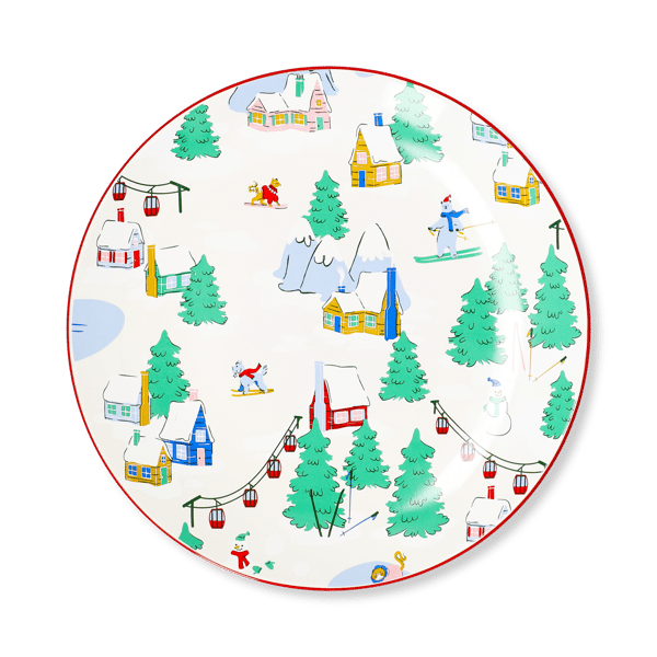 Plate with a snowy mountain village design