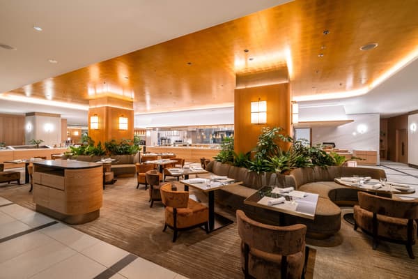 All-Day Dining Remone's bright, open dining space facing a Japanese garden