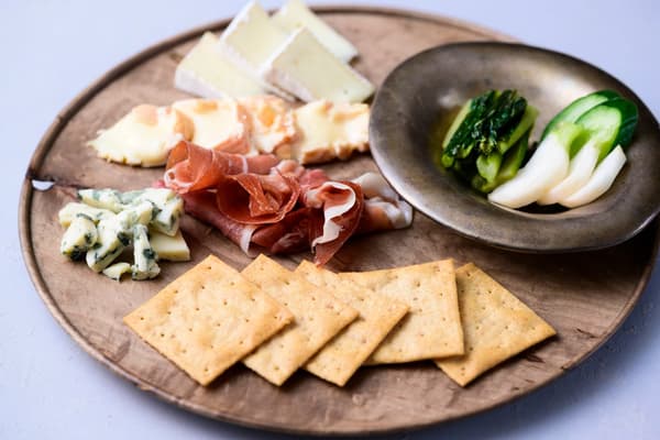 Fermentation plate with Nagano cheese, prosciutto, and pickles