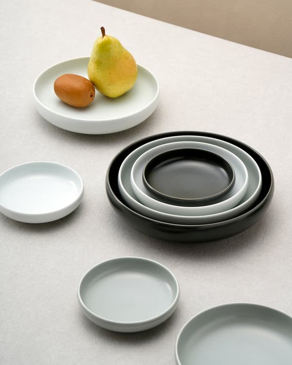 Glossy white porcelain and two matte grays