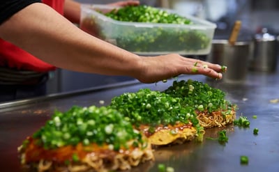 Hiroshima Style Okonomiyaki: How Does It Differ from Osaka’s Version?