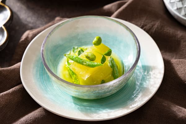 Amuse: jade-simmered winter melon with traditional Aichi-Gifu beans and kinome oil