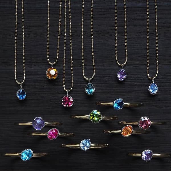 Cocon ring collection featuring sapphire and tourmaline