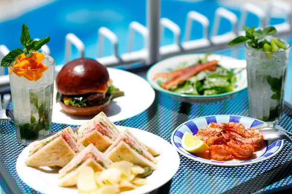 Poolside dining area OUTRIGGER