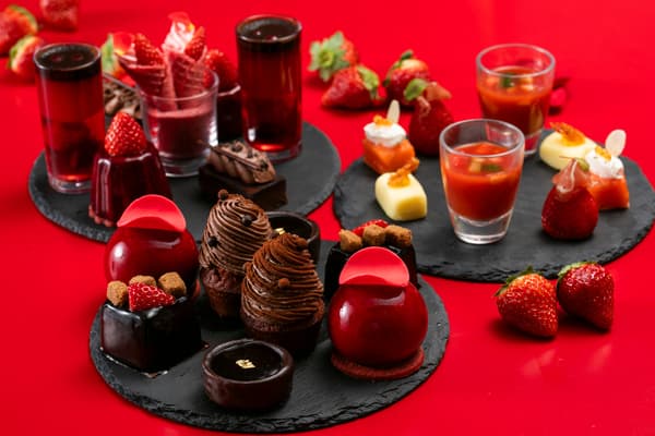 Strawberry afternoon tea set with desserts and beverages