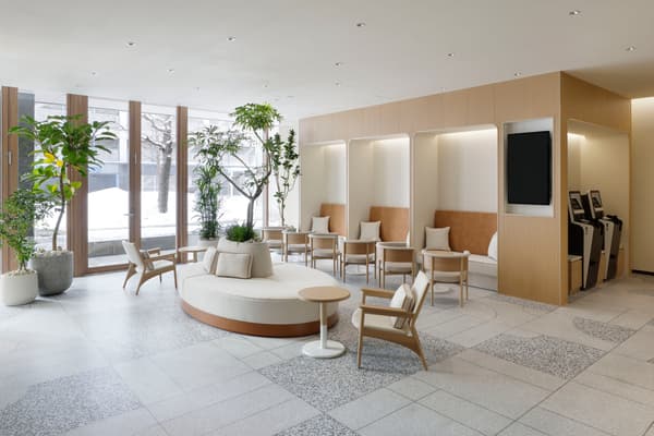 Welcoming lobby lounge with abundant greenery