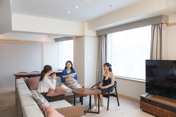 Club Royal Suite Room living area with city views