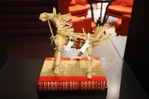 Each straw horse carefully crafted by hand