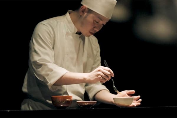 Chef finishing Japanese cuisine