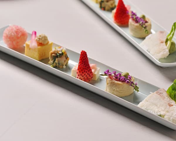 Savory dishes presented like petit gateaux