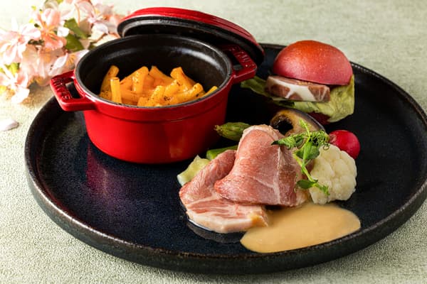 Hot dishes: pork confit, mac 'n' cheese, and cherry blossom-pink bun mini burgers