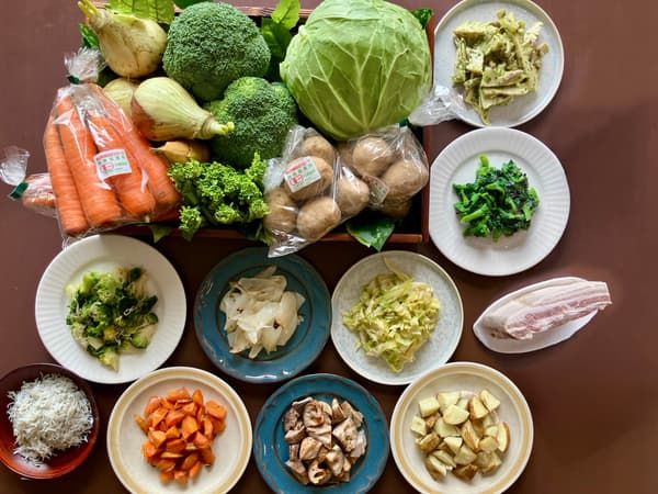 Buffet corner with spring seasonal vegetables and dishes
