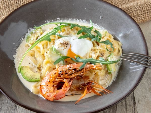 Red shrimp and avocado carbonara-style pasta