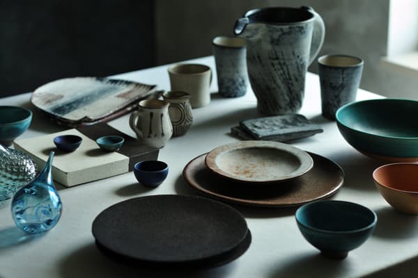 Tableware and art objects by local Okinawan artists accent the meal