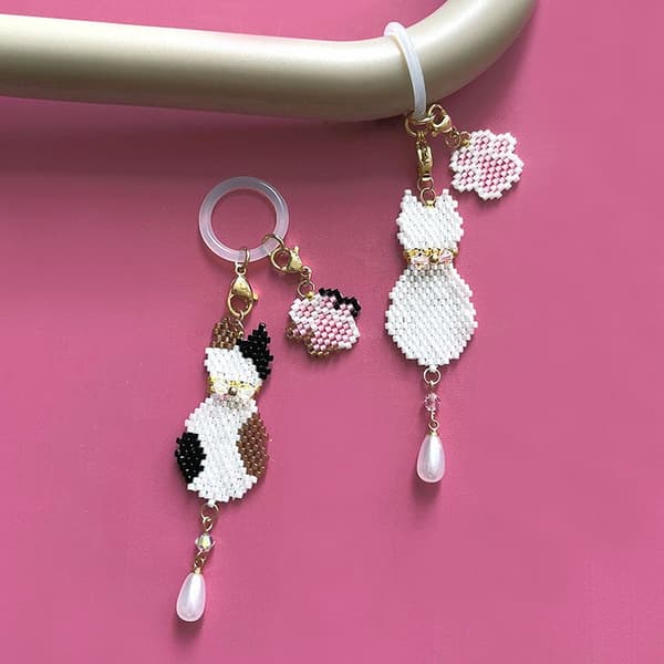 White cat bookmark marker