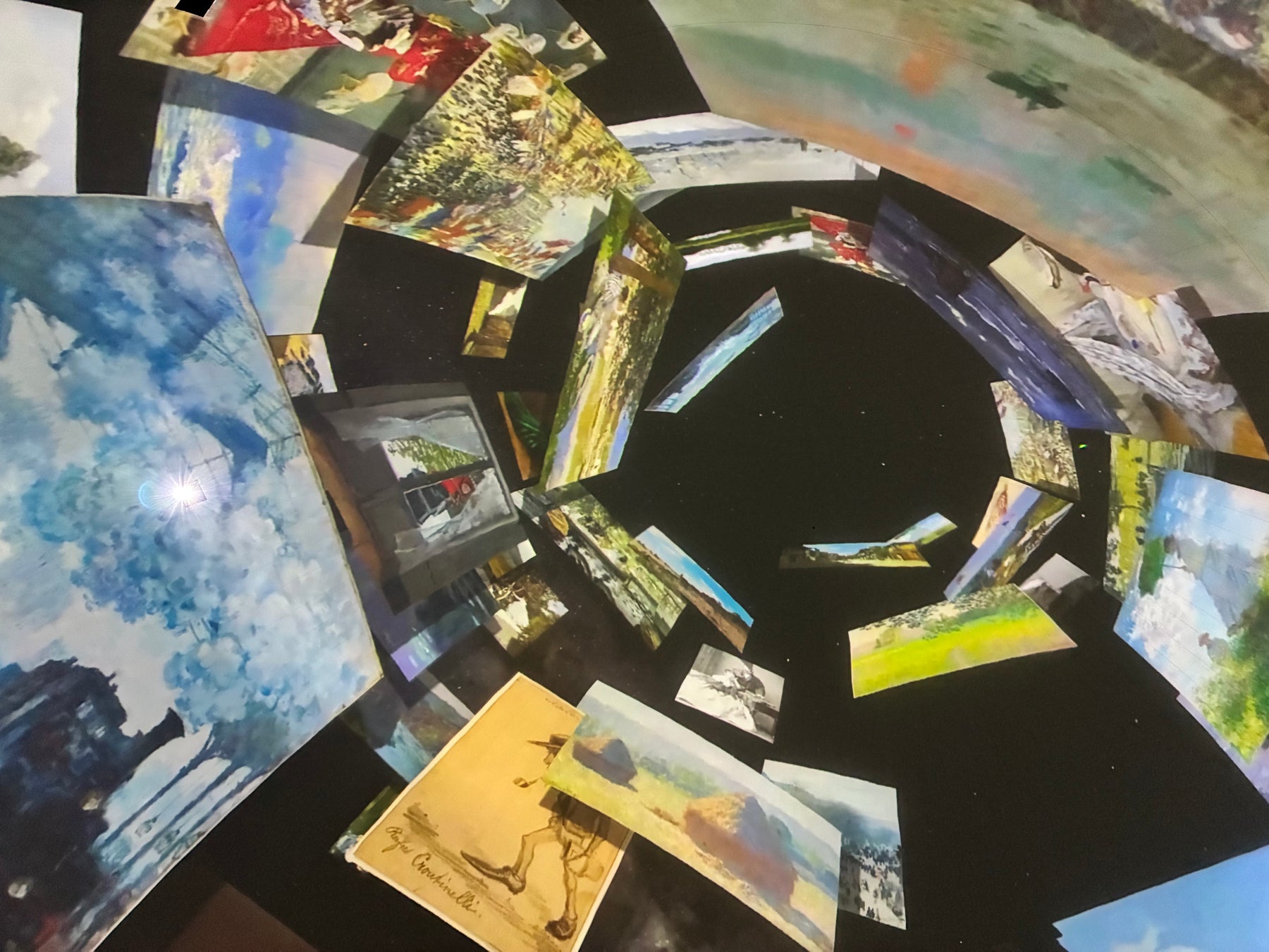 Immersive planetarium dome showing Monet's artwork