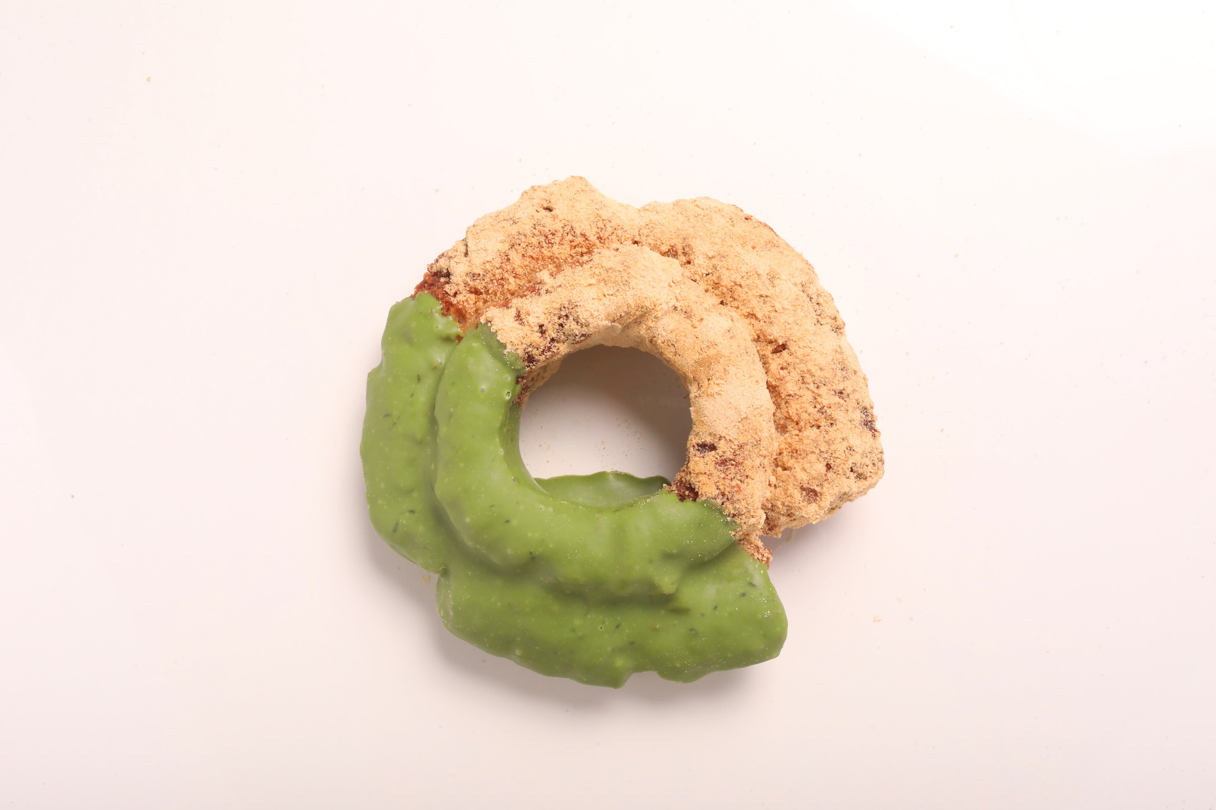 Uji Matcha Fashion - 220 yen: A donut using quality Kyoto Uji matcha chocolate and fragrant roasted soybean flour sugar.