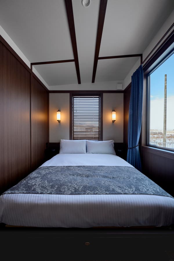 View of Hakodate Station platform trains from the living room window