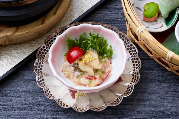 Steamed abalone and hokki clam salad with butter lettuce